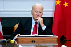President Joe Biden listens as he meets virtually with Chinese President Xi Jinping from the Roosevelt Room of the White House in Washington,Nov. 15, 2021. The Biden administration announced on Thursday that it is levying new sanctions against several Chinese biotech and surveillance companies operating out of Xinjiang province, casting another shot at Beijing over human rights abuses against Uyghurs in western China.