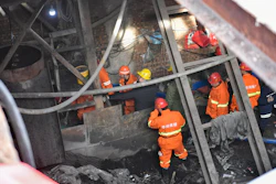 More than 20 people were trapped after a coal mine was flooded in the city of Xiaoyi, north China's Shanxi province, as a result of illegal mining, local authorities said Thursday.