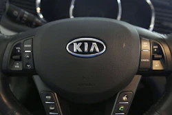 Steering wheel inside of a Kia car at a dealership in Elmhurst, Ill., Oct. 5, 2012.