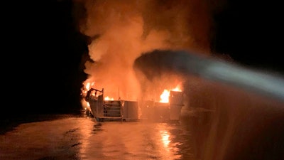 Firefighters respond to a fire aboard the Conception dive boat in the Santa Barbara Channel off the coast of Southern California, Sept. 2, 2019.