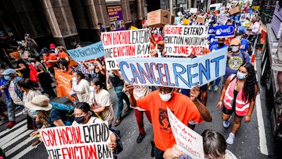 Housing activists march across town toward New York Gov. Kathy Hochul's office, calling for an extension of pandemic-era eviction protections on Aug. 31, 2021, in New York.