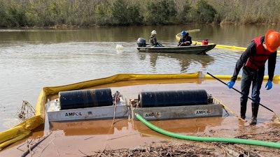 Cleanup work at the site where more than 300,000 gallons of diesel spilled outside New Orleans.