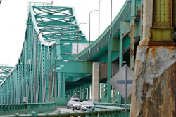 Drivers take an exit ramp off the Tobin Memorial Bridge on March 31, 2021, in Chelsea, Mass.