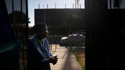 Q.C. Kelker, 83, at her home across the street from the Jefferson oil drill site, Los Angeles, June 24, 2021.