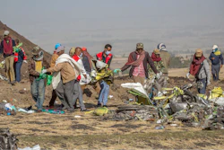 Rescuers work at the scene of an Ethiopian Airlines crash near Bishoftu, Ethiopia, March 11, 2019.