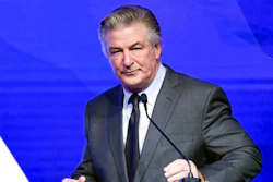 Alec Baldwin performs emcee duties at the Robert F. Kennedy Human Rights Ripple of Hope Award Gala at New York Hilton Midtown on Dec. 9, 2021, in New York. Baldwin said Saturday, Jan. 8, 2022, any suggestion that he's not cooperating with a probe into last fall's shooting on his movie set that killed cinematographer Halyna Hutchins is a lie. He responded via Instagram to stories that discussed why authorities who served him with a search warrant for his phone haven't gotten it yet.