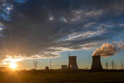 Steam rises from the cooling tower of the nuclear power plant of Gundremmingen, Bavaria, Germany, Friday, Dec. 31, 2021. Draft European Union plans that would allow nuclear and gas energy to remain part of the bloc's path to a climate-friendly future came under immediate criticism over the weekend from both environmentalists and some governing political parties in EU member nations. Germany shut three plants, including this one, at the end of last year.