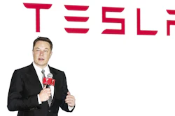 Tesla CEO Elon Musk holds a press conference to introduce the auto-driving system upgrade for Chinese Tesla owners in Beijing, China on Oct. 23, 2015. Activists on Monday, Jan 3. 2022 are appealing to Elon Musk and Tesla Inc. to close a new showroom in China's northwestern region of Xinjiang, where officials are accused of abuses against mostly Muslim ethnic minorities.