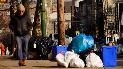 The omicron variant is sickening so many sanitation workers around the U.S. that waste collection in Philadelphia and other cities has been delayed or suspended.