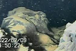 Images from a remote-controlled submersible robot show damaged areas inside the Fukushima nuclear power plant damaged in the 2011 earthquake and tsunami, Wednesday, Feb. 9, 2022, in Fukushima, Japan. The robot captured images of what appears be mounds of damaged fuel that had melted and fell to the bottom of the hardest-hit reactor at the nuclear plant for the first time since the 2011 disaster.