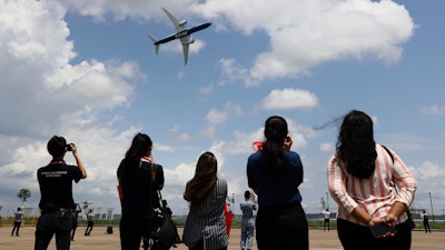 Boeing's B777-9 participates in a fly-by during the Singapore Airshow, Feb. 15, 2022.
