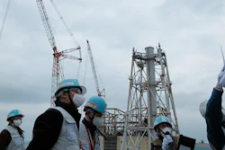 Members of the International Atomic Energy Agency inspect the site of Fukushima nuclear plant in Okuma town, Japan, Feb. 15, 2022.