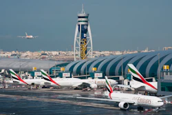 An Emirates jetliner comes in for landing at Dubai International Airport, Dec. 11, 2019.