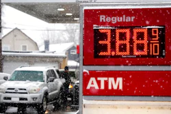 Motorists fill up vehicles at a gas station Wednesday, Feb. 16, 2022, in Denver. U.S. consumer confidence declined modestly this month but remains high, even as prices for just about everything continue to rise.