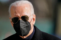 President Joe Biden walks on the South Lawn of the White House after stepping off Marine One, Sunday, Feb. 6, 2022, in Washington. Biden returned to Washington after spending the weekend at his home in Delaware.