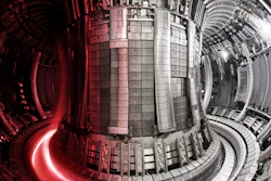 Nuclear fusion facility: JET interior with superimposed plasma.
