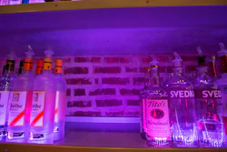 An empty space on a liquor shelf where Russian vodka used to be located at The Sidetrack, a gay bar on the north side of Chicago, July 29, 2013. The United States and Europe are slapping official sanctions on Russian banks and tech companies. But bars and liquor stores across America and Canada have found another way to punish Russia for invading Ukraine: They’re pulling Russian vodka off their shelves and promoting Ukrainian brands instead.