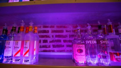 An empty space on a liquor shelf where Russian vodka used to be located at The Sidetrack, a gay bar on the north side of Chicago, July 29, 2013. The United States and Europe are slapping official sanctions on Russian banks and tech companies. But bars and liquor stores across America and Canada have found another way to punish Russia for invading Ukraine: They’re pulling Russian vodka off their shelves and promoting Ukrainian brands instead.