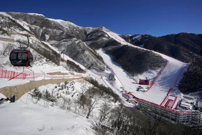 The finish area of the Alpine ski venue at the 2022 Winter Olympics was white because of artificially made snow.