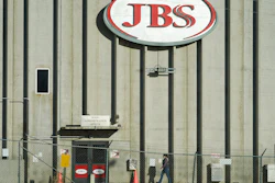 Meatpacking giant JBS has agreed to a $52.5 million settlement in a beef price-fixing lawsuit, Thursday, Feb. 3, 2022, that some say supports their concerns about how the lack of competition in the industry affects prices.