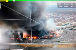 Aerial image taken by a drone shows a blown-up building near the outskirts of Kyiv.