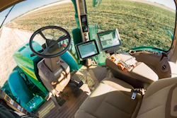 An autonomous John Deere tractor plowing a field, Blue Earth, Minn.