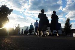 Women make their way to work in the garment district in Maseru, Lesotho, Friday, Feb. 25, 2022 When the coronavirus pandemic hit the world two years ago, the global fashion industry crumpled when faced with collapsing demand, brands canceled orders worth billions of dollars and few felt the effects so harshly as the tens of millions of workers, most of them women, who stitched the world's clothes.