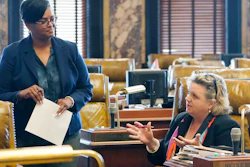 Mississippi state Sen. Angela Turner Ford, D-West Point, left, listens to Sen. Nicole Boyd, R-Oxford, at the Capitol in Jackson, March 28, 2022.
