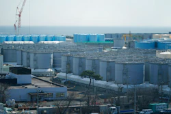 Tanks storing treated radioactive water after it was used to cool the melted fuel are seen at the Fukushima Daiichi nuclear power plant, run by Tokyo Electric Power Company Holdings (TEPCO), in Okuma town, northeastern Japan, Thursday, March 3, 2022. The government has announced plans to release the water after treatment and dilution to well below the legally releasable levels through a planned undersea tunnel at a site about 1 kilometer offshore.