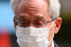 Greg Kelly, former executive of Japanese automaker Nissan, walks in to the Tokyo District Court in Tokyo Thursday, March 3, 2022.