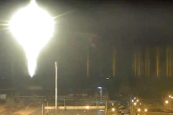 This image made from a video released by Zaporizhzhia nuclear power plant shows bright flaring object landing in grounds of the nuclear plant in Enerhodar, Ukraine Friday, March 4, 2022. Russian forces shelled Europe’s largest nuclear plant early Friday, sparking a fire as they pressed their attack on a crucial energy-producing Ukrainian city and gained ground in their bid to cut off the country from the sea.