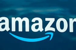 An Amazon logo appears on an Amazon delivery van, on Oct. 1, 2020, in Boston. Amazon has deals with three rocket companies to help launch communications satellites that the online retail giant says will help provide fast, affordable broadband to millions of underserved people around the world. Amazon said Tuesday, April 5, 2022, that Arianespace, United Launch Alliance and Blue Origin will combine for up to 83 launches during the next five years, deploying the majority of Amazon’s 3,236 low-earth satellites to be used for what Amazon is calling “Project Kuiper.'