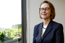In this July 13, 2016 file photo, Oregon Attorney General Ellen Rosenblum poses for a photo at her office in Portland, Ore. The state of Oregon has sued an Illinois-based COVID-19 testing company, saying its owners took millions of dollars in federal funds and insurance money for themselves and boasted about buying a mansion and expensive sports cars. Rosenblum sued the Center for Covid Control, or CCC, and its testing partner, Doctors Clinical Laboratory, for deceptively marketing testing services and for violating Oregon's Unlawful Trade Practices Act.