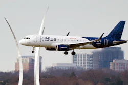 A JetBlue passenger flight passes the Air Force Memorial as it prepares to land at Reagan Washington National Airport in Arlington, Va., across the Potomac River from Washington, Wednesday, Jan. 19, 2022. Air travel is expected to make close to a full recovery in 2022, and for airlines looking to take advantage of the rebound, size matters. Fleet size is a key motive for JetBlue’s bid to woo budget carrier Spirit Airlines and break up that company’s deal with rival Frontier.
