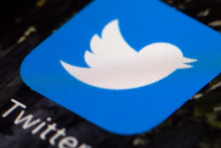 The Twitter icon is displayed on a mobile phone in Philadelphia on April 26, 2017. Twitter said in a statement Friday, April 15, 2022, that its board of directors has unanimously adopted a “poison pill” defense in response to Tesla CEO Elon Musk’s proposal to buy the company and take it private.