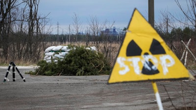 A Russian firing position sits adjacent to the Chernobyl nuclear power plant near Chernobyl, Ukraine, Saturday, April 16, 2022. Thousands of tanks and troops rumbled into the forested Chernobyl exclusion zone in the earliest hours of Russia’s invasion of Ukraine in February, churning up highly contaminated soil from the site of the 1986 accident that was the world's worst nuclear disaster.