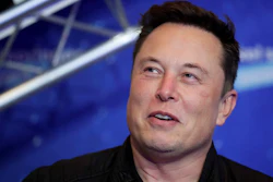 Tesla and SpaceX CEO Elon Musk arrives on the red carpet for the Axel Springer media award in Berlin on Dec. 1, 2020. Musk says he has lined up $46.5 billion in financing to buy Twitter, and he’s trying to negotiate an agreement with the company. The Tesla CEO says in documents filed Thursday, April 21, 2022 with U.S. securities regulators that he’s exploring a tender offer to buy all of the social media platform’s common stock for $54.20 per share in cash.