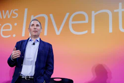 In this Dec. 5, 2019, file photo, AWS CEO Andy Jassy, discusses a new initiative with the NFL during AWS re:Invent 2019 in Las Vegas. In his first letter to Amazon shareholders, Jassy offered a defense of wages and benefits the company gives its warehouse workers while also vowing to improve injury rates inside the facilities. Jassy, who took over from Amazon founder Jeff Bezos as CEO last July, wrote the company has researched and created a list of the top 100 “employee experience pain points” and is working to solve them. A report released this week by a coalition of four labor unions found Amazon employed 33% of all U.S. warehouse workers in 2021, but was responsible for 49% of all injuries in the industry.