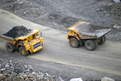 A loaded dump truck passes an empty truck as it carries away coal at the Kedrovsky open-pit coal mine in Kemerovo, Russia, Tuesday, June 16, 2015. Poland’s government has decided to block imports of coal from Russia. The move is an element in a larger strategy to reduce energy dependence on Russia which gained new urgency after the invasion of Ukraine. The government of Prime Minister Mateusz Morawiecki agreed to impose financial penalties on the private entities importing Russian coal into Poland, with Polish customs officials tasked with carrying out checks.