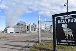 The Hardin Generating Station, a coal-fired power plant that is also home to the cryptocurrency 'mining' operation Big Horn Data Hub, is seen on April 20, 2022, in Hardin, Mont. Energy from burning coal is used to power thousands of computers that are kept on site to produce the digital currency known as bitcoins.