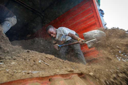 Farmers offload livestock manure from a truck, that will be used to fertilize crops due to the increased cost of fertilizer that they say they now can't afford to purchase, in Kiambu, near Nairobi, in Kenya Thursday, March 31, 2022. Russia's war in Ukraine has pushed up fertilizer prices that were already high, made scarce supplies rarer still and squeezed farmers, especially those in the developing world struggling to make a living.