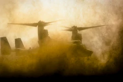 A U.S. Marine MV-22B Osprey lands at Babadag Training Area, Romania, in this 2015 photo illustration, kicking up clouds of potentially dangerous particulates in the process. Research at NPS employing the latest in Ultra High Temperature Ceramics has the potential to increase the resilience of turbine engines to particulate ingestion, critical for DOD aircraft operating in sandy and salty environments.