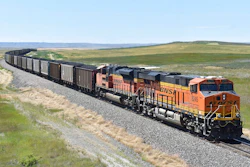 A BNSF railroad train hauling carloads of coal from the Powder River Basin of Montana and Wyoming is seen east of Hardin, Mont., on July 15, 2020. The major freight railroads are hiring aggressively and asking customers to cut the number of carloads they are shipping to reduce congestion along the rail network in response to concerns from agricultural and ethanol groups that prompted regulators to schedule a hearing on the problems.