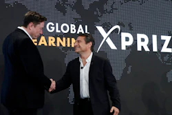 Tesla CEO Elon Musk, left, shakes hands with XPRIZE founder and Executive Chairman Peter Diamandis during an XPRIZE presentation event in Los Angeles, May 15, 2019. From algae farming to producing a sort of artificial limestone, ideas for reducing greenhouse gas in the atmosphere are getting a funding boost from famed entrepreneur Musk. The Tesla electric vehicle and SpaceX rocket company developer is bankrolling a $100 million XPRIZE Carbon Removal competition for the most promising ways to reduce atmospheric carbon dioxide by grabbing the gas right out of the air.
