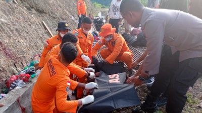 An overloaded truck hit a cliff and flipped over near an illegal gold mine in Indonesia's West Papua province on Wednesday, killing a number of people and leaving others injured, police said.