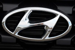 The Hyundai logo shines off the grille of an unsold vehicle at a Hyundai dealership Sunday, Sept. 12, 2021, in Littleton, Colo.