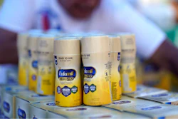 Infant formula is stacked on a table during a baby formula drive to help with the shortage Saturday, May 14, 2022, in Houston. Parents seeking baby formula are running into bare supermarket and pharmacy shelves in part because of ongoing supply disruptions and a recent safety recall.