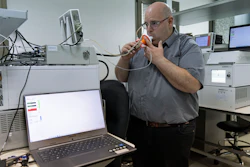 Israeli Harel Hershtik, vice president of strategy and technology at Scentech Medical, demonstrates his company's product, which he says can detect certain diseases by analysing a patient's breath, at the company's office in Rehovet, Israel, May 3, 2022. When he was 20 years old, Hershtik planned and executed a murder, shooting his victim in the head and burying the body in a crime that a quarter of a century later is still widely remembered for its grisly details. Today, he is the brains behind an Israeli health-tech startup with the backing of prominent public figures and deep-pocketed investors.