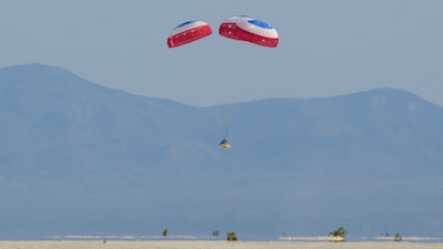 Boeing's CST-100 Starliner spacecraft lands at White Sands Missile Range's Space Harbor, Wednesday, May 25, 2022, in New Mexico.