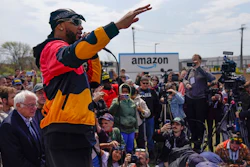 Christian Smalls, president of the Amazon Labor Union, speaks at a rally outside an Amazon facility on Staten Island in New York, Sunday, April 24, 2022. Amazon and the nascent group that successfully organized the company’s first-ever U.S. union are headed for a rematch Monday, May 2, 2022, when a federal labor board will tally votes cast by warehouse workers in yet another election on Staten Island.